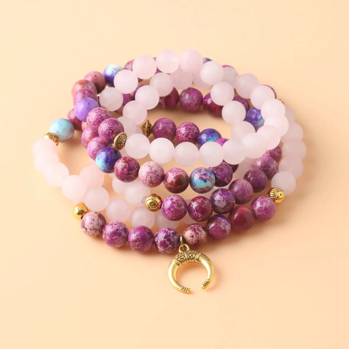 Pink crystal round Emperor Stone beads pendant necklace on a casual unisex cord, approximately 45 cm long