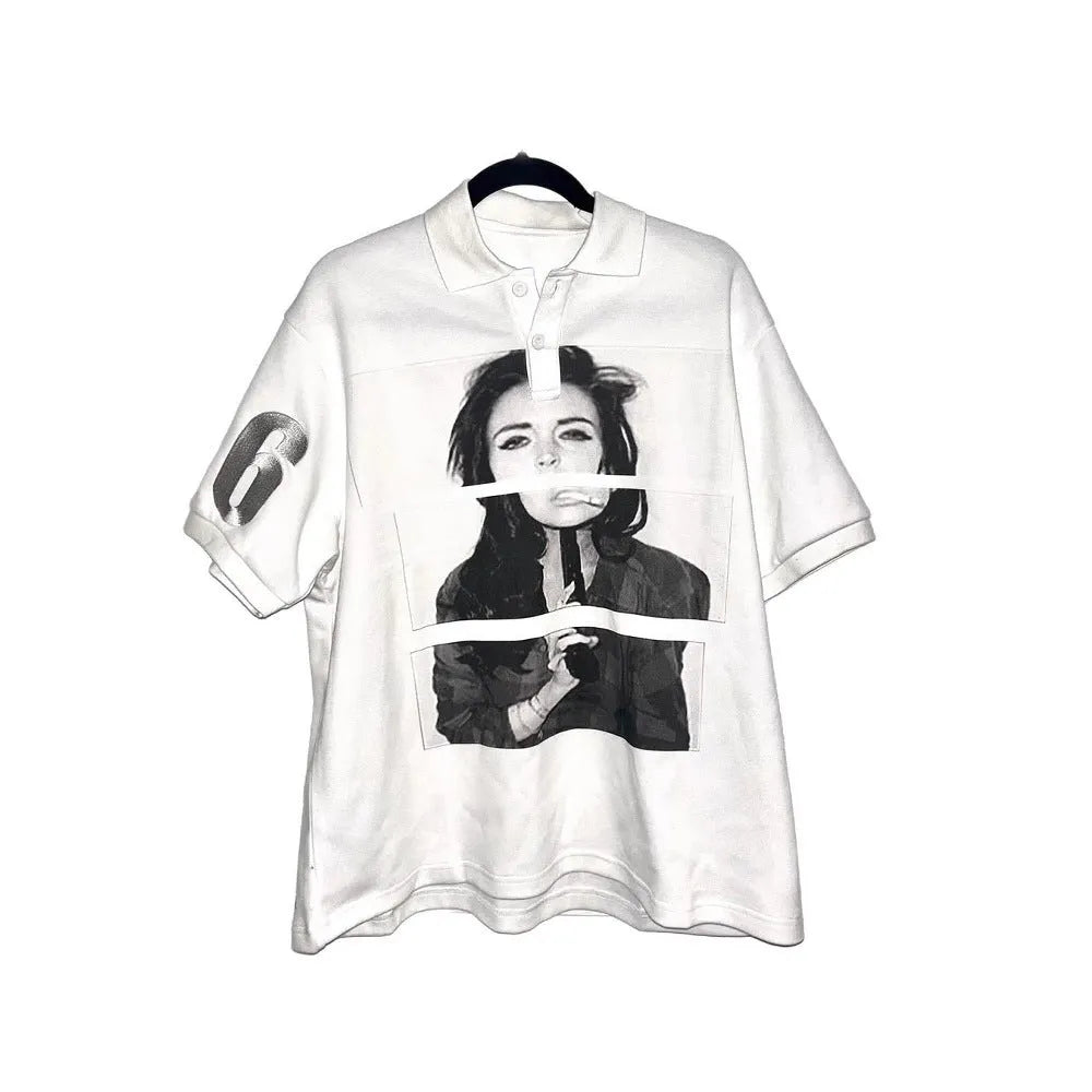 Short-sleeved printed polo shirt in polyester, shown on a hanger, straight cut design.