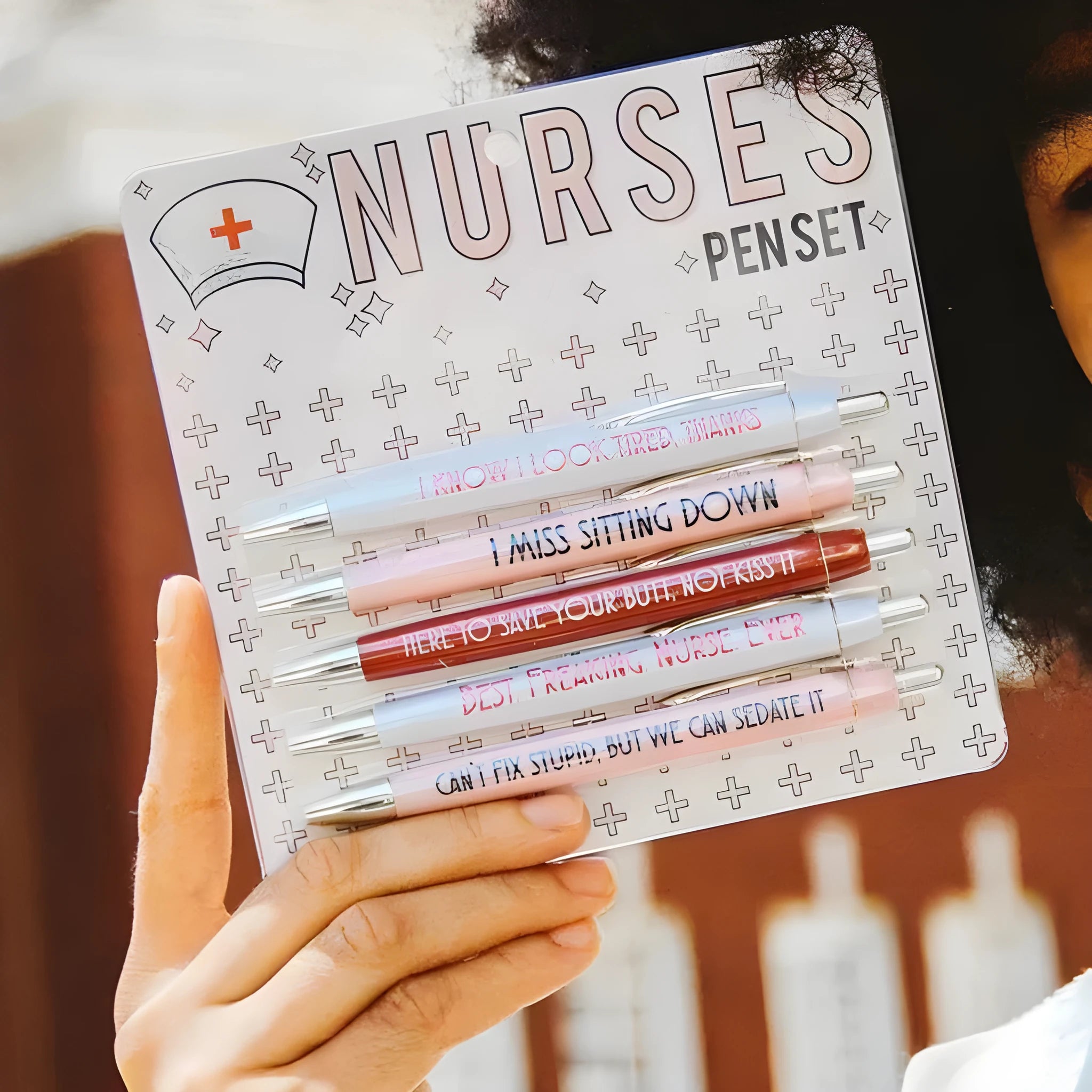 Five plastic retractable ballpoint pens with nurse theme copywriting design, each 14cm long