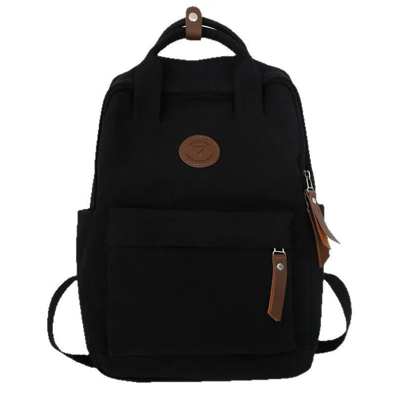 Black fashion backpack made of Oxford cloth with curved shoulder strap and retro stitching for school and travel