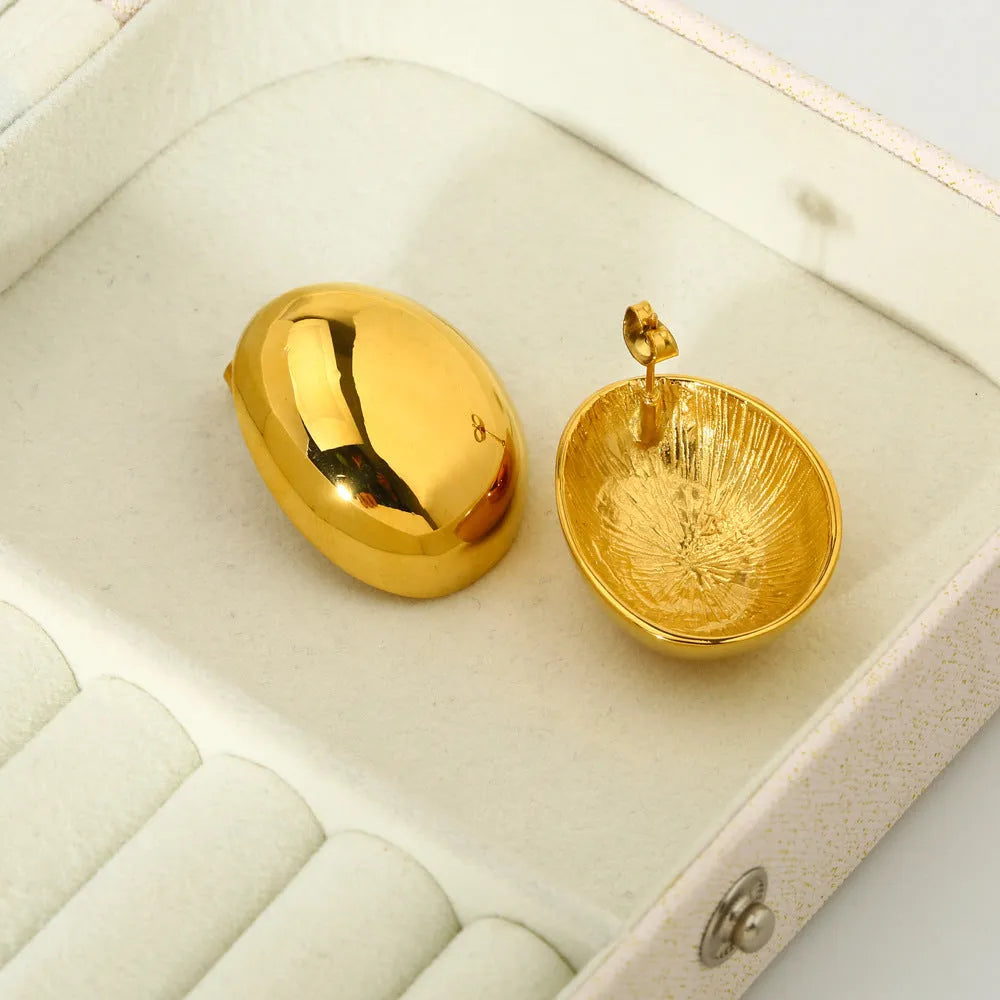 Geometric ear studs with exaggerated glazed surface in 18K gold electroplated stainless steel