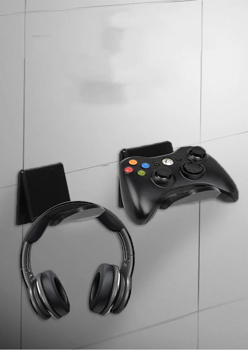Universal game controller wall mount bracket shown in black, white, and transparent colours.