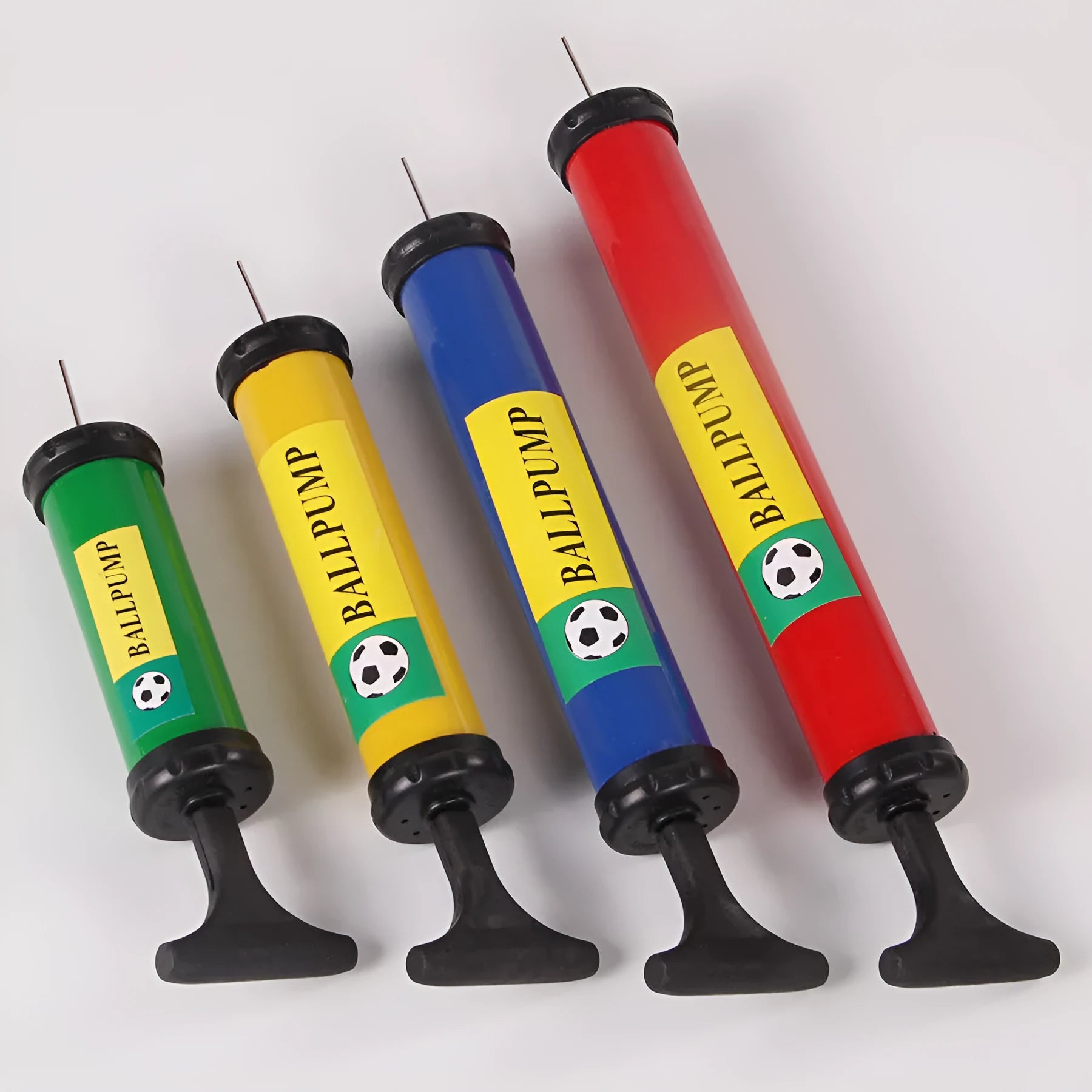 Mixed colour plastic manual pump for inflating basketballs, balloons, volleyballs, and footballs.