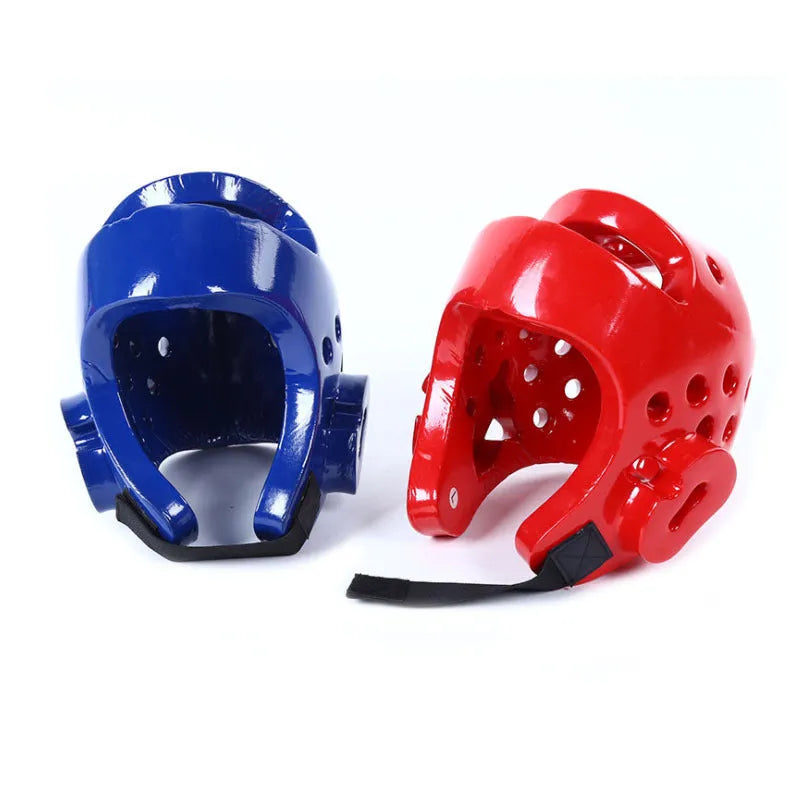Complete martial arts protective gear set showing red boxing gloves, leg guards and helmet