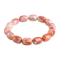 Natural cherry agate bracelet with 10x14mm barrel beads and Ruyi decorative elements