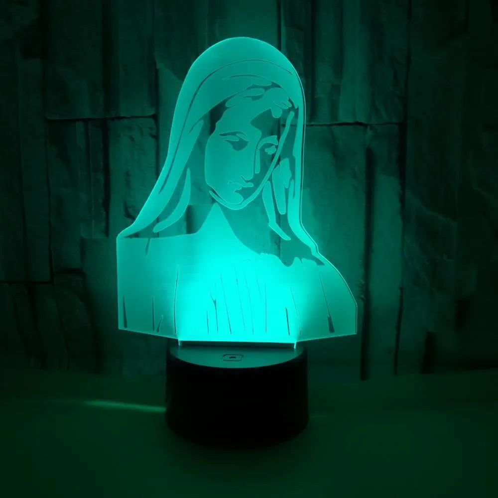 3D LED kids night light with colourful ring pattern, USB cable, and touch-sensitive base on a table.
