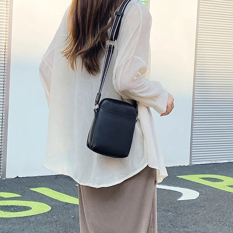 Solid colour PU leather mobile phone shoulder bag showing crossbody and shoulder carry options