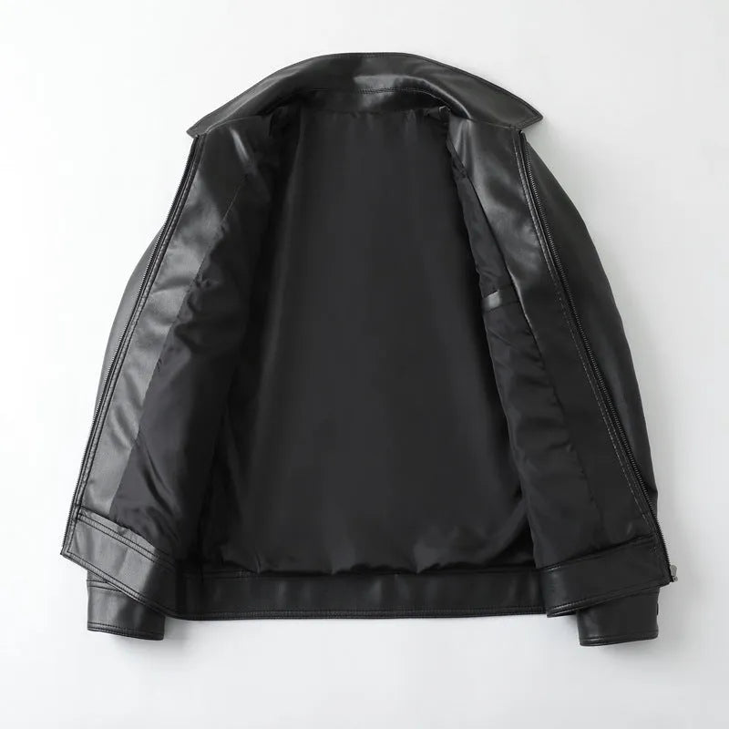 Black men's loose fit PU leather jacket with zipper pockets on a model.