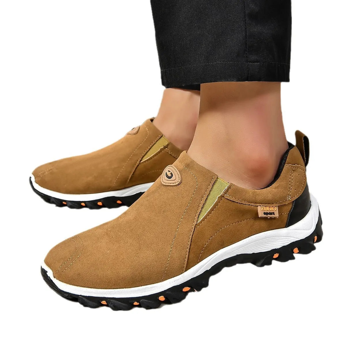 Men's thin grey overshoes with round toe, rubber sole, and shallow mouth design shown on a foot.