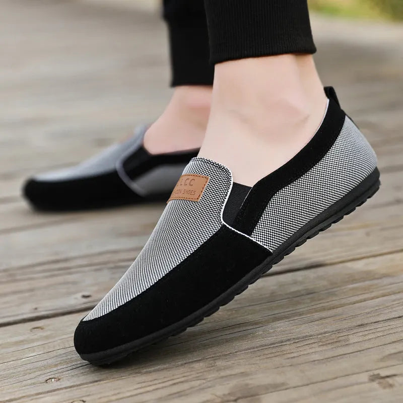 Men's canvas casual board shoes in grey with rubber sole and lace-up closure