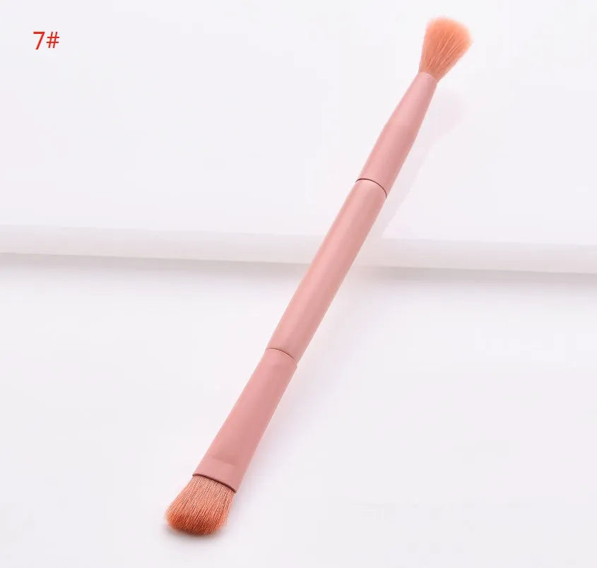 Ten makeup brushes with wooden handles including powder, foundation, and detail brushes for complete face application