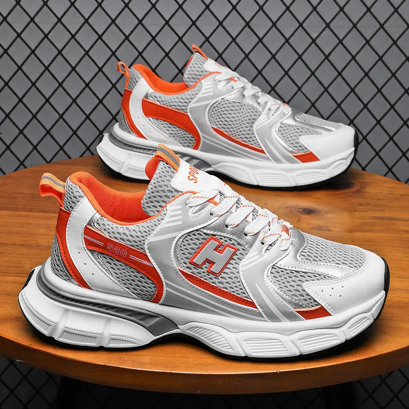Men's mesh running shoes in black, white and grey, or white orange colours with plastic sole