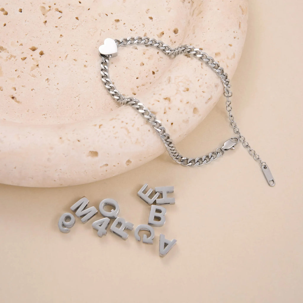 Gold electroplated titanium steel necklace with letter A charm on a 40.5cm blade chain