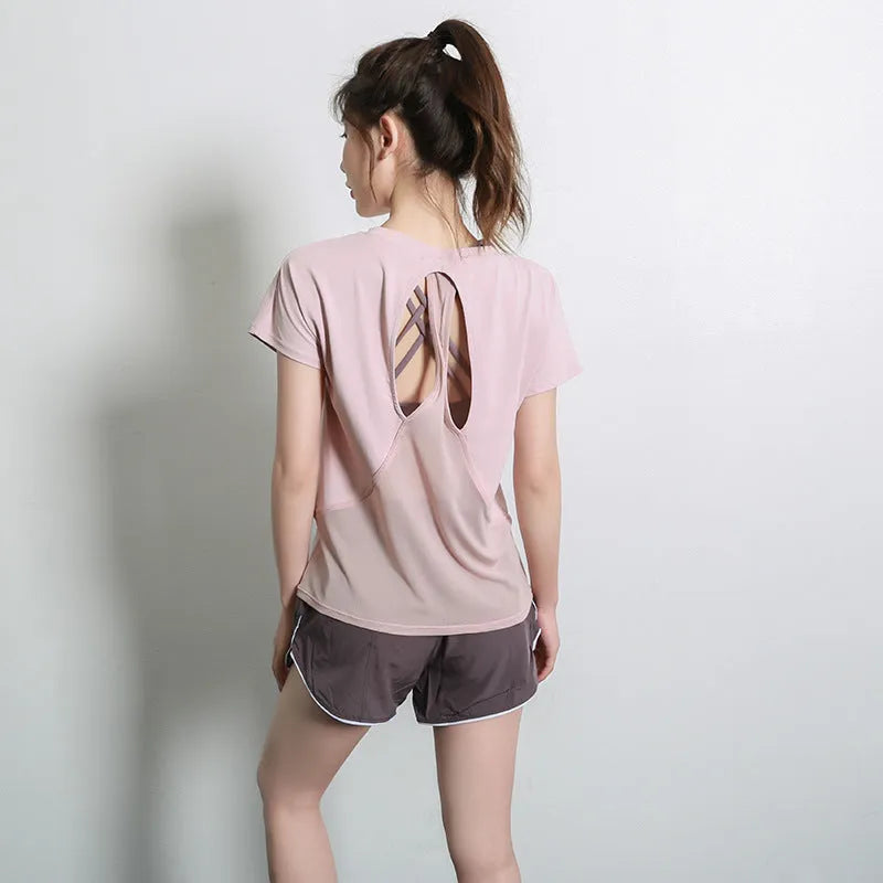 Women's short sleeve polyester sports t-shirt in pink, available in sizes S to XL