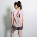 Women's short sleeve polyester sports t-shirt in pink, available in sizes S to XL