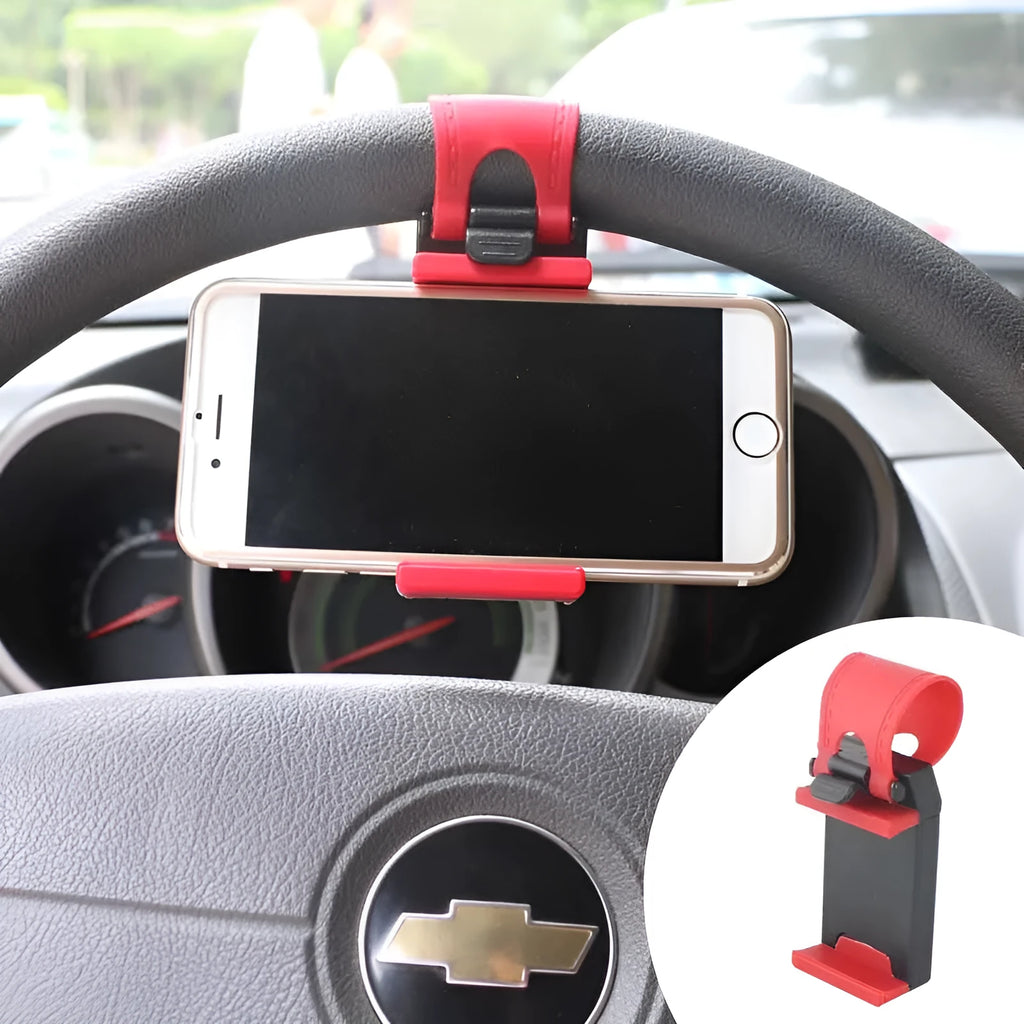 Black steering wheel phone clip holder mounted on car steering wheel