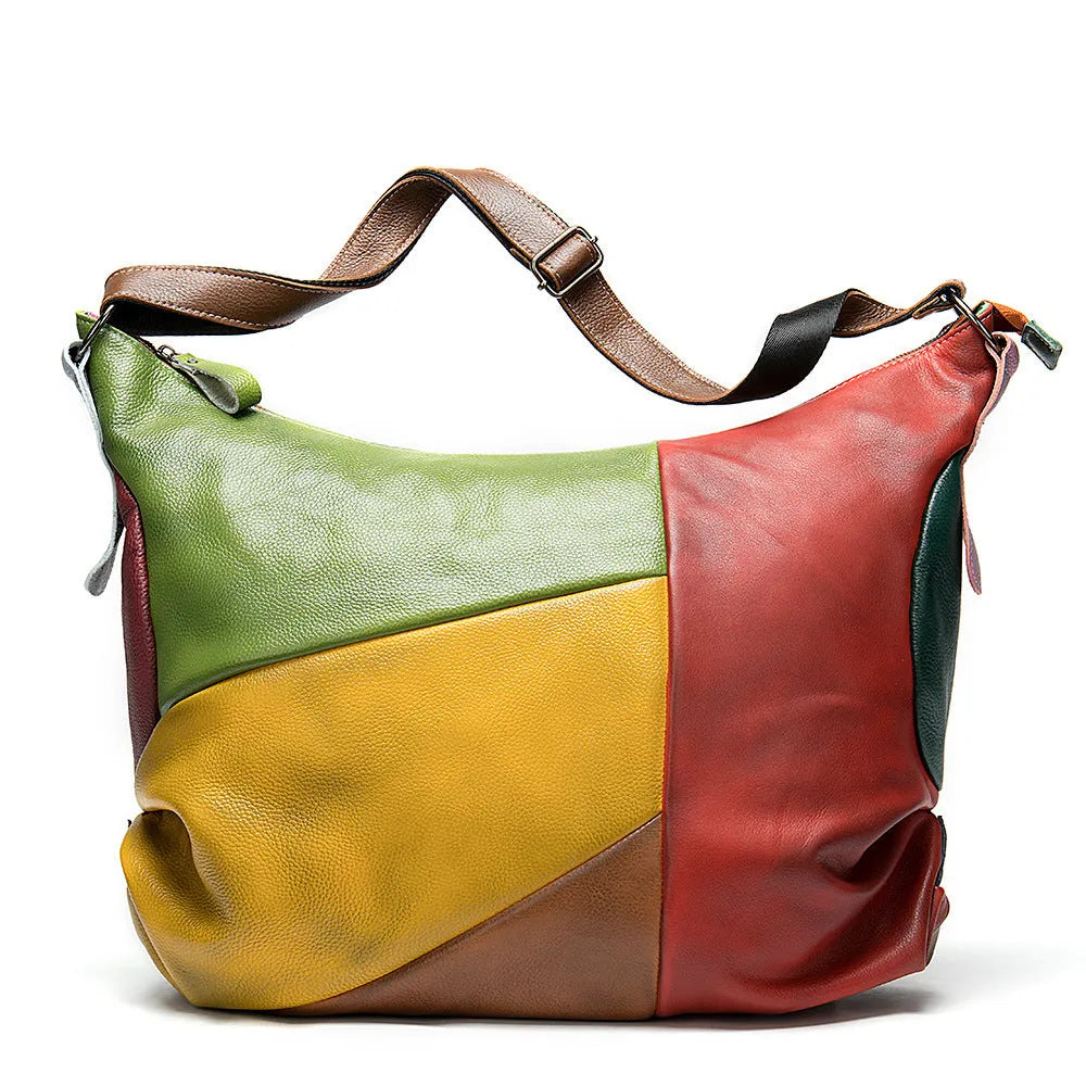 Cowhide leather crossbody travel bag showing stitching detail and 48cm dimensions