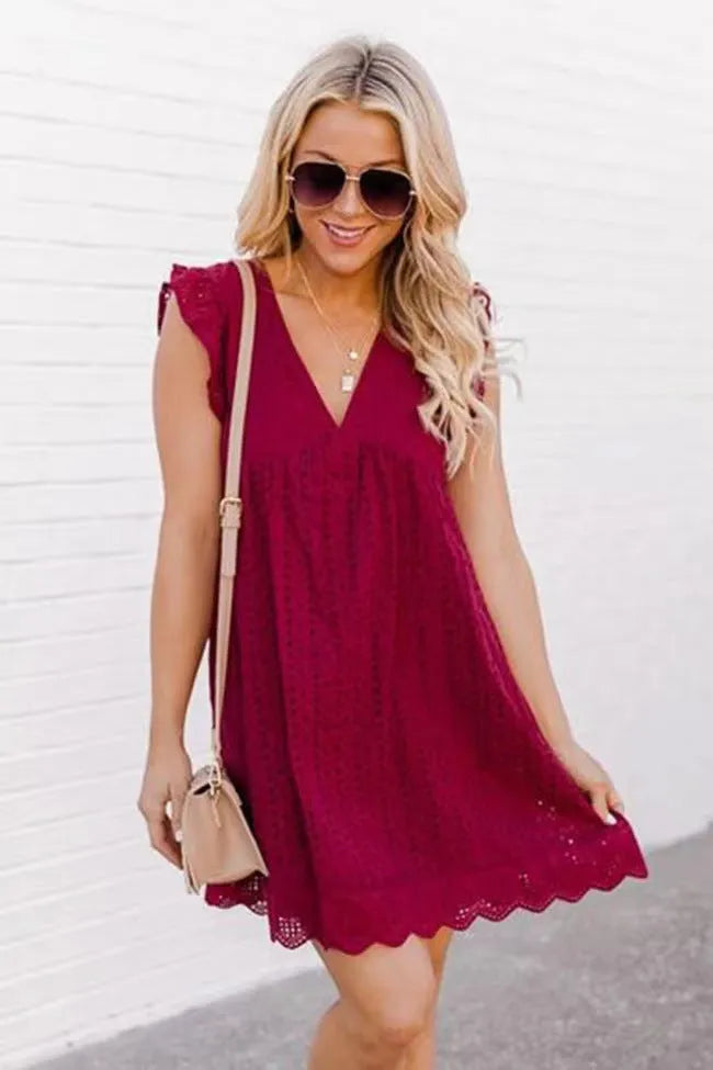 Sleeveless V-neck lace beach dress with jacquard cutout and pocket, cotton polyester blend, A-line silhouette