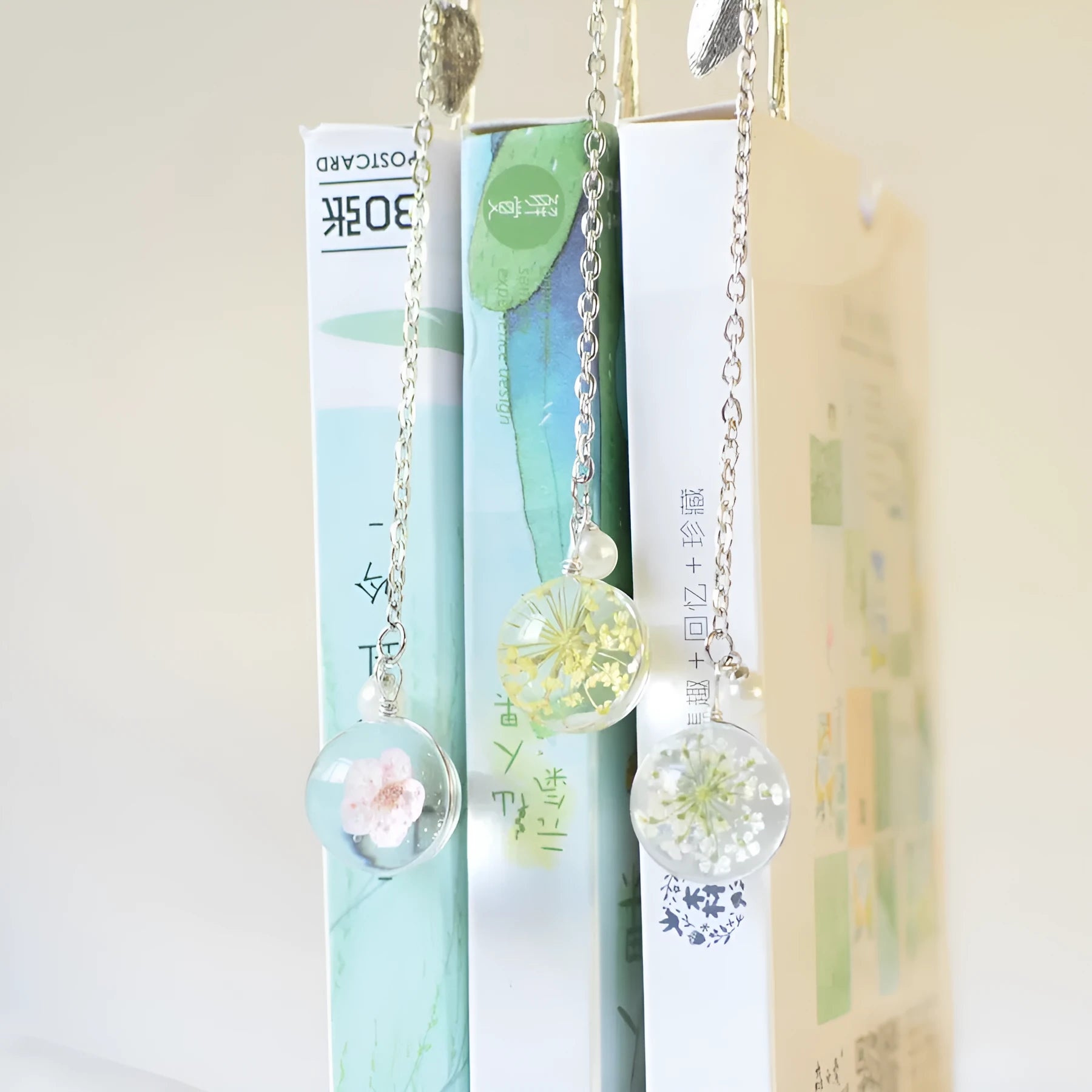 Dried flower specimen bookmark in alloy metal frame, 12cm length with botanical details