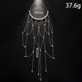 Gold and silver pearl mesh tassel hair chain for women on a white background.