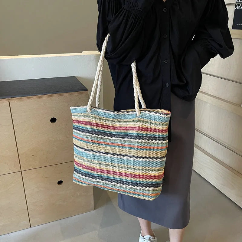 Blue straw woven nylon shoulder bag with single strap and polyester lining