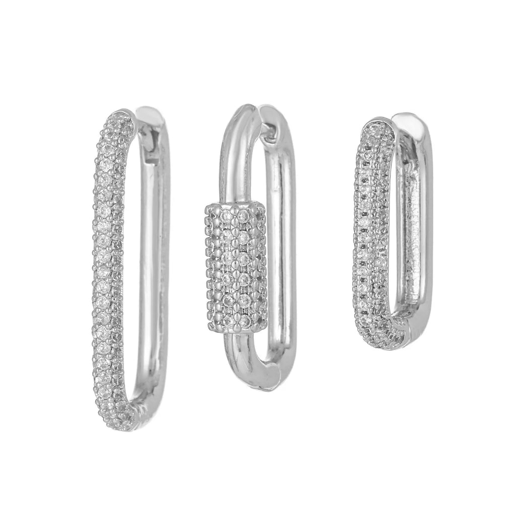 Three geometric earrings with micro inlaid zircon on square clips in gold and white finishes