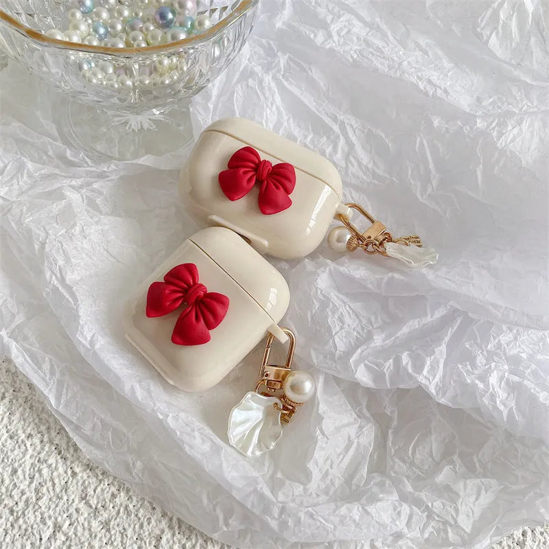 Beige red bow shell TPU clamshell case for AirPods 1, 2, 3 and Pro wireless earphones