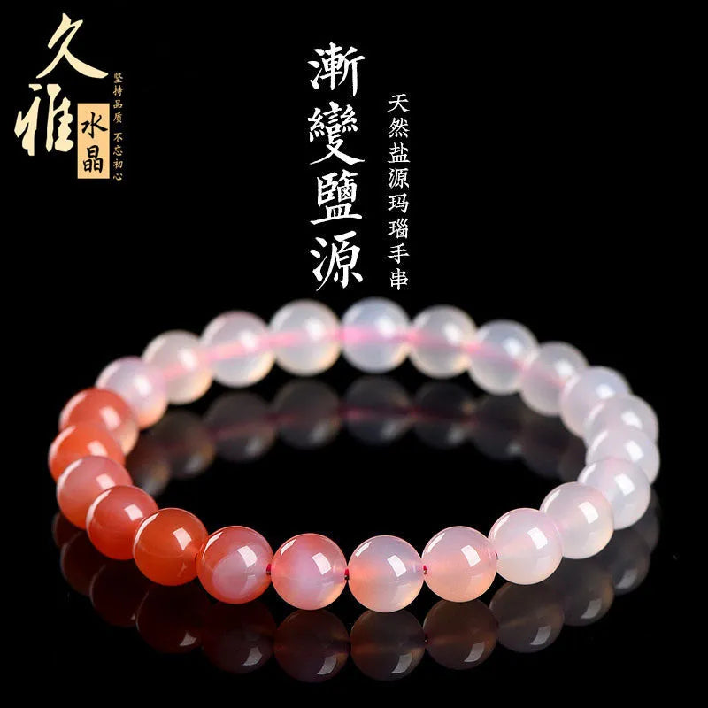 Natural gradient Yanyuan agate bracelet in geometric single-circle design on a neutral background.