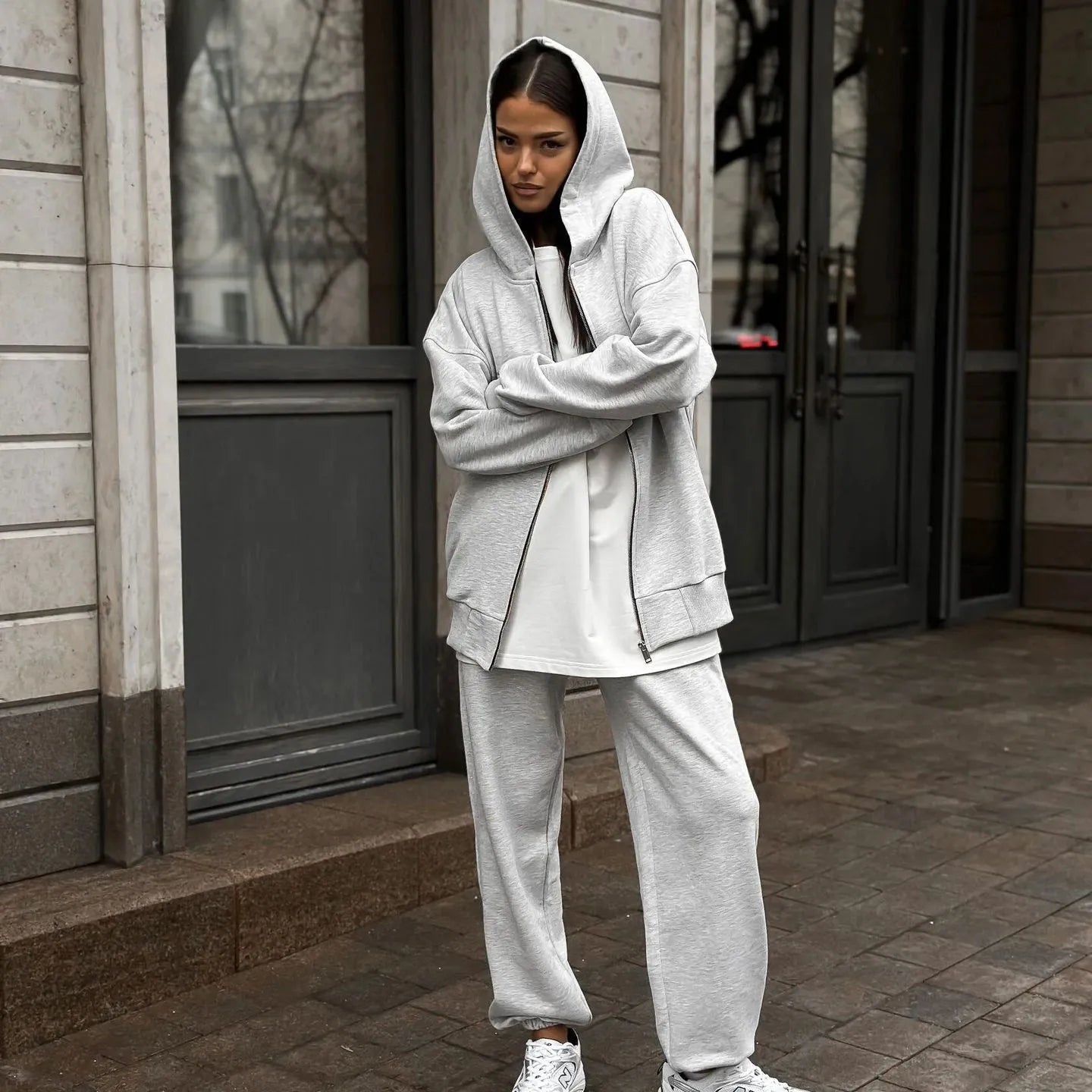 Red loose fit street style coat and trousers two-piece set on a model