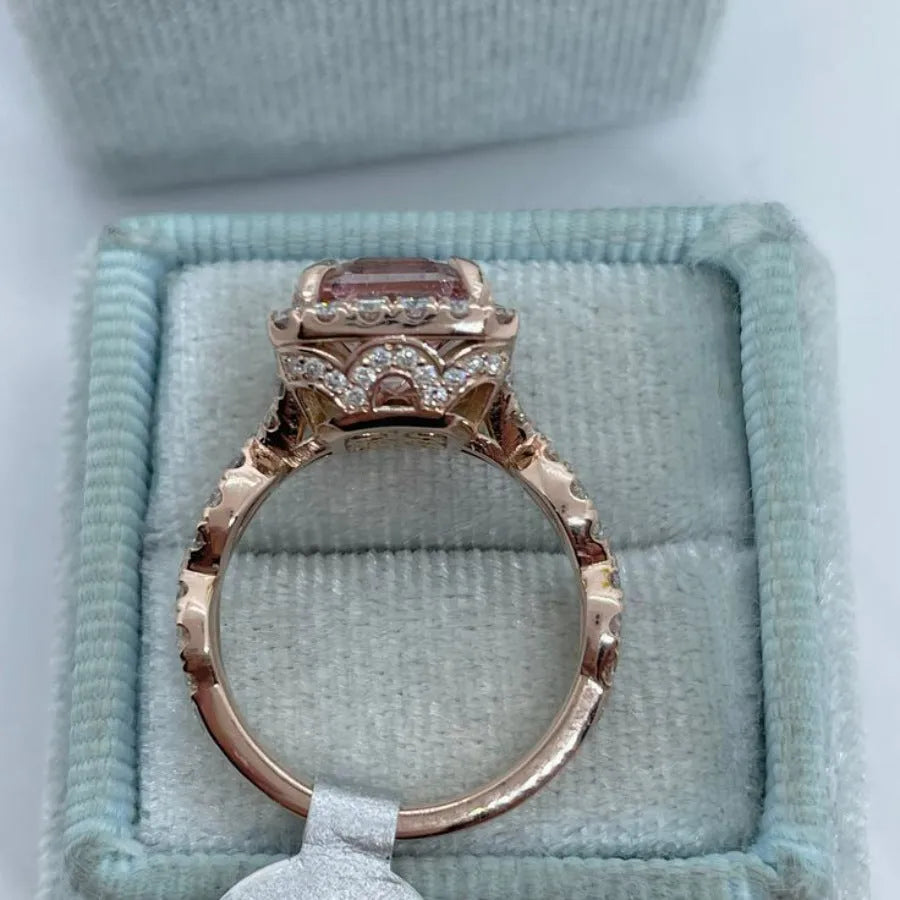 Rose gold geometric electroplated alloy ring on white background, unisex design
