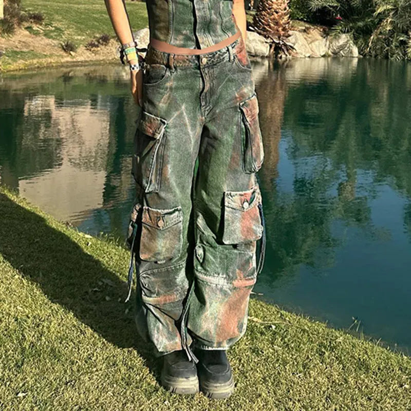 Loose fit cargo denim trousers with gradient coloured pockets and multiple storage compartments