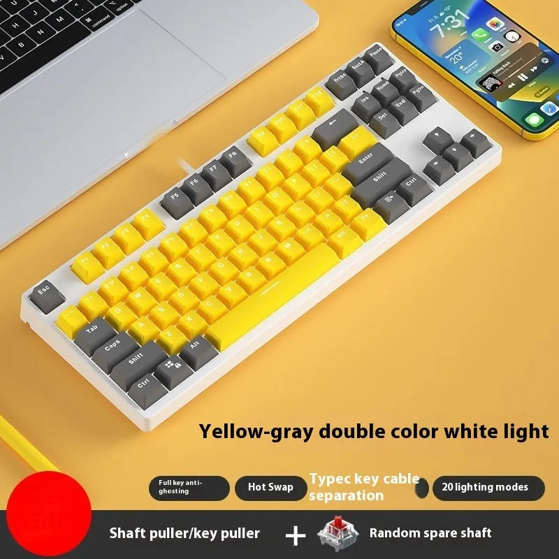 87-key wired mechanical gaming keyboard with colourful keycaps on a metal frame, shown with key puller and cable.