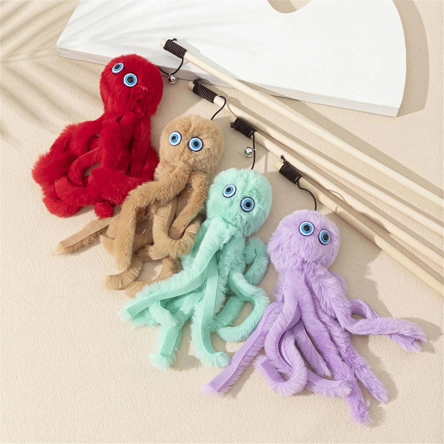 Octopus-themed cat toy with long stick attachment in bright colours for indoor feline play