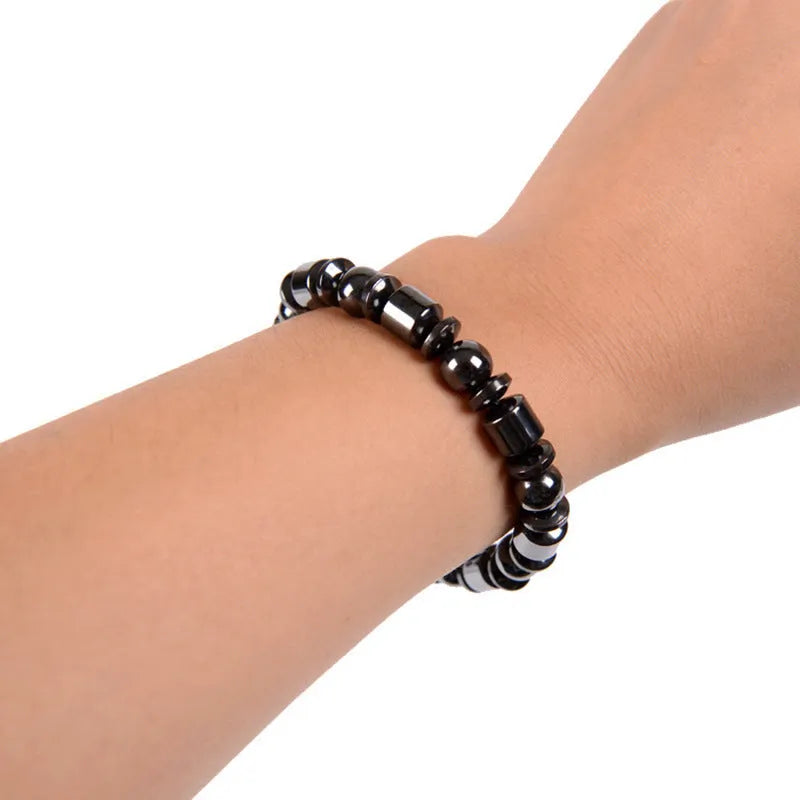 Black pentagram stone magnetic therapy bracelet with a stretch band for men and women.