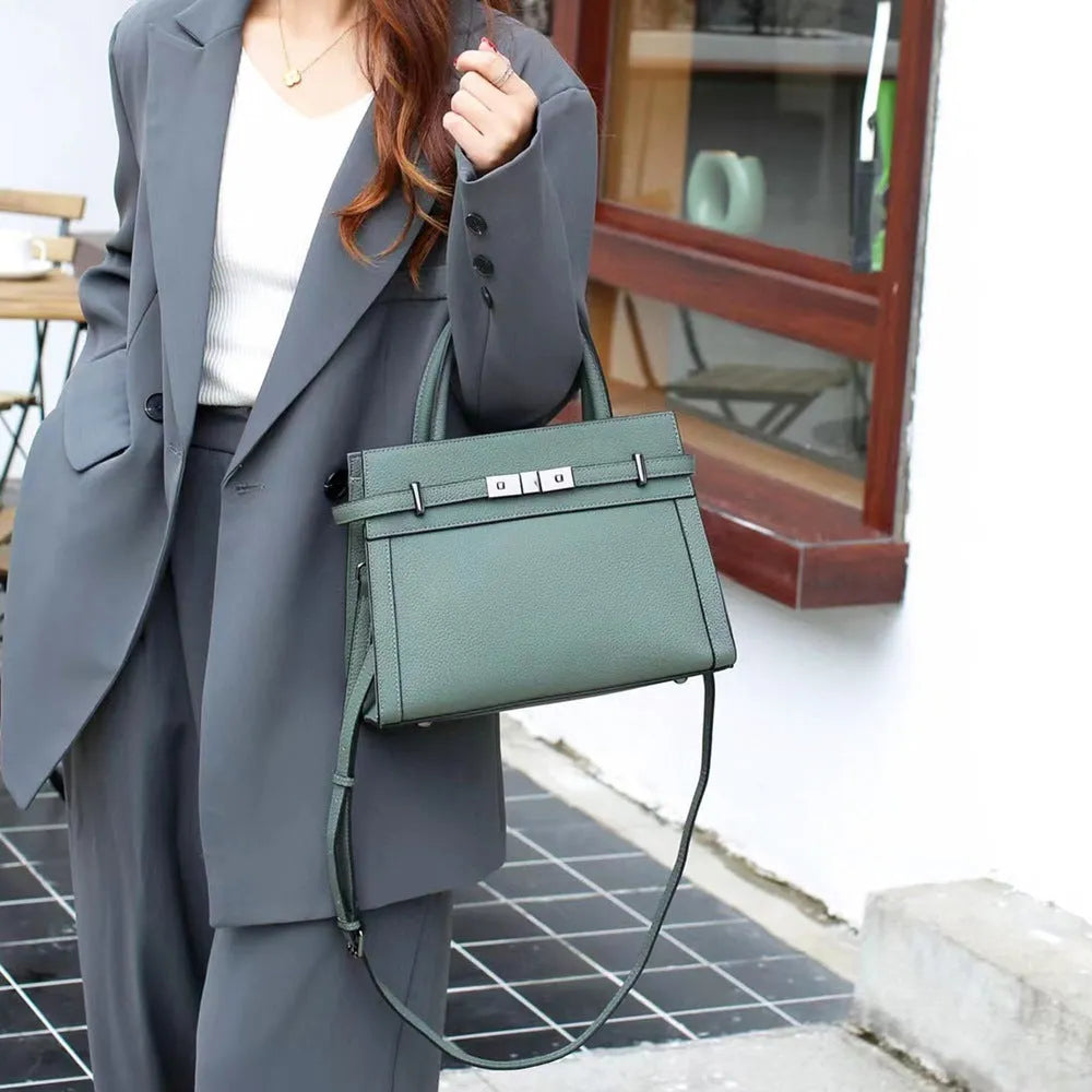 Genuine leather horizontal square shoulder bag with internal pockets in almond green colour.