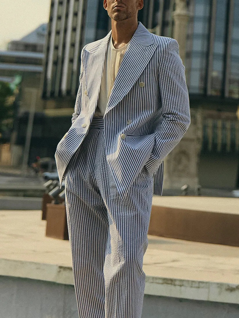 Blue and white striped polyester suit set showing blazer and matching trousers for formal wear
