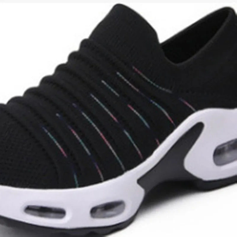 Plus size fly-knit sock shoes in black with stretch mesh upper and round toe