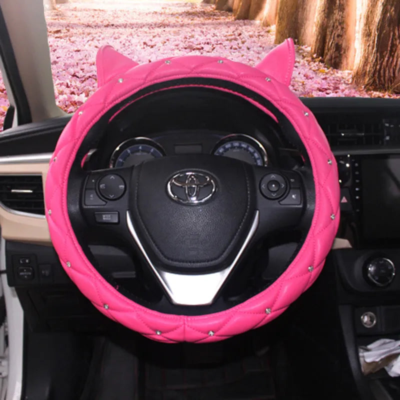 Black Rose Red steering wheel cover with rhinestones from Super Cute Ear series on a car steering wheel