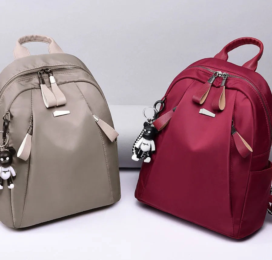 Medium square rucksack in Oxford cloth with phone compartment and double straps