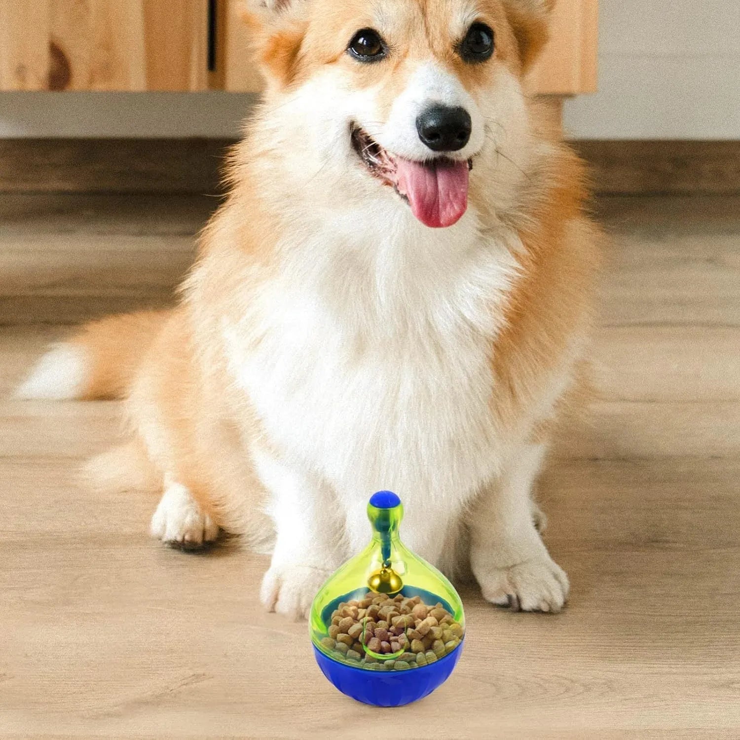 Blue pet treat dispenser tumbler toy for dogs and cats with interactive food puzzle design