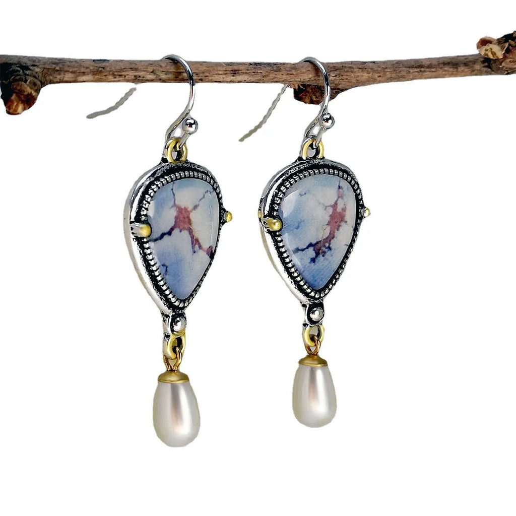 Retro blue drop earrings with synthetic opal and pearl on electroplated metal, 49mm long.
