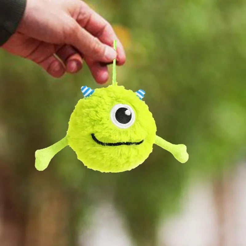 Green interactive dog teething toy ball with sound, 12cm diameter, soft plush and TPR construction