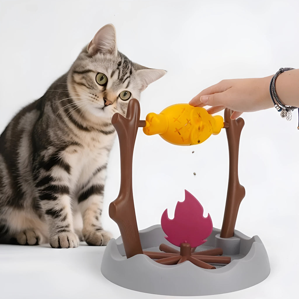 Barbecue style tumbling cat food puzzle feeder toy measuring 30cm cubed