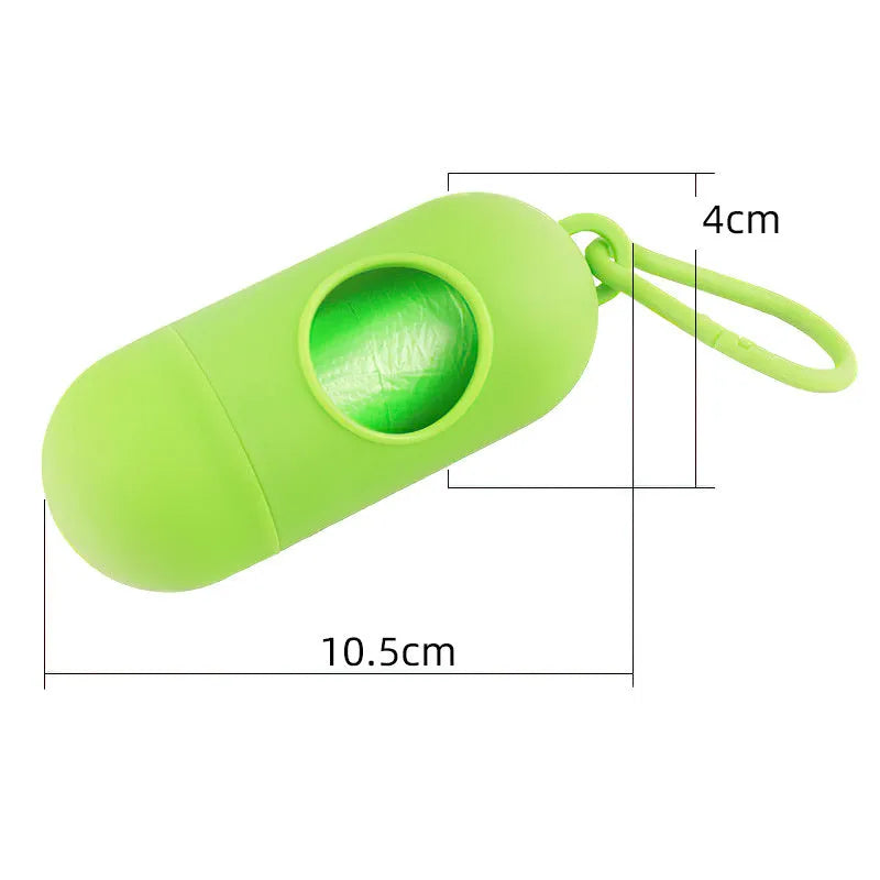A compact black dog poo bag holder with a side hook and a Velcro strap at the bottom.