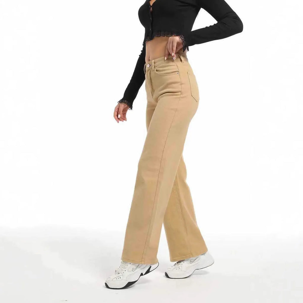 Women's apricot wide leg straight jeans with high waist on a hanger