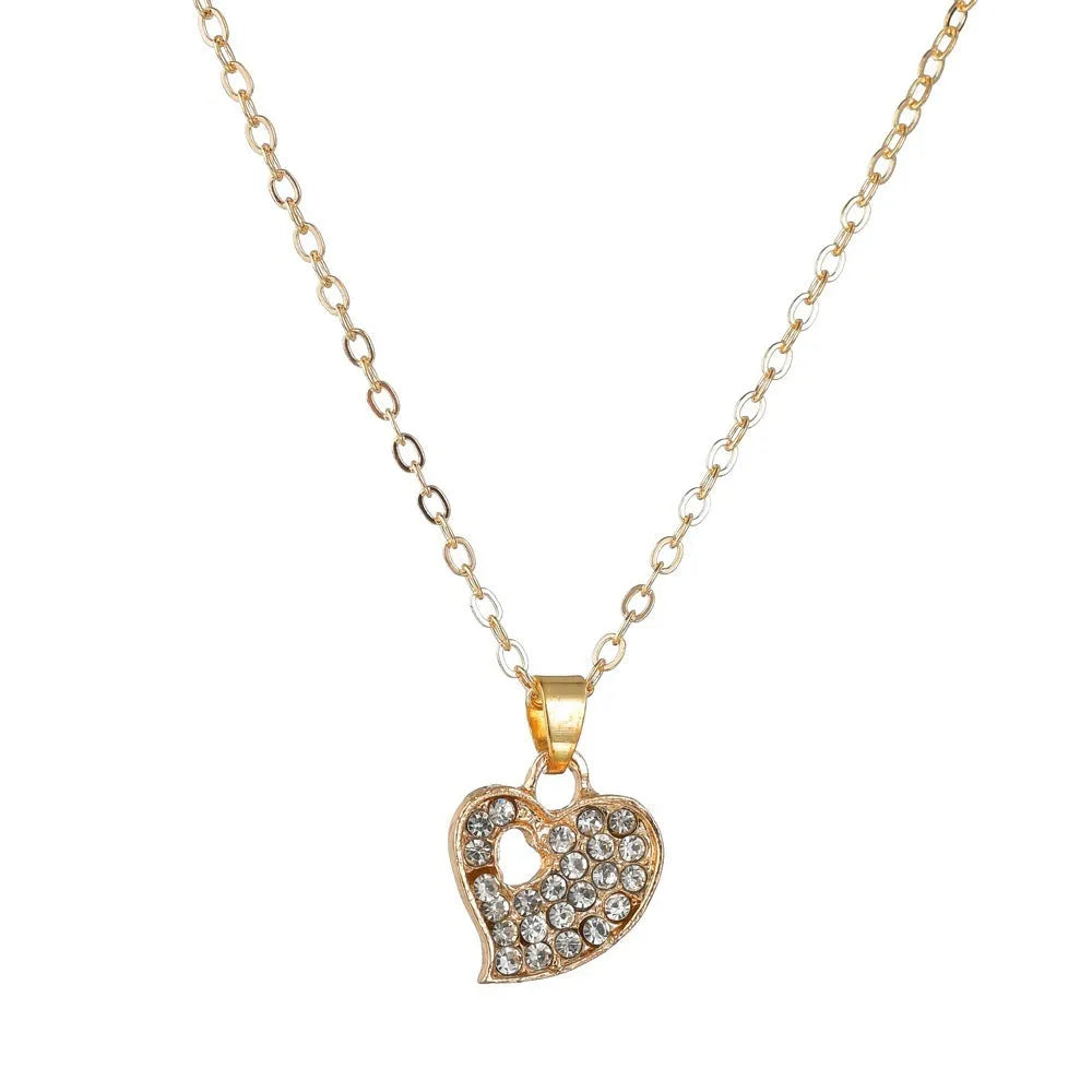 Gold electroplated alloy women's jewellery set with earrings, love and bell pendant decorations