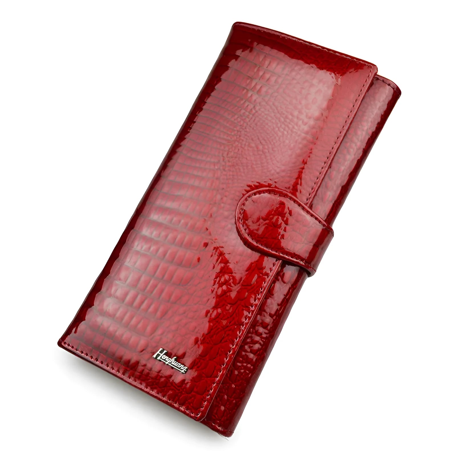 Women's patent leather coin purse with crocodile pattern in red colour showing pigskin lining interior