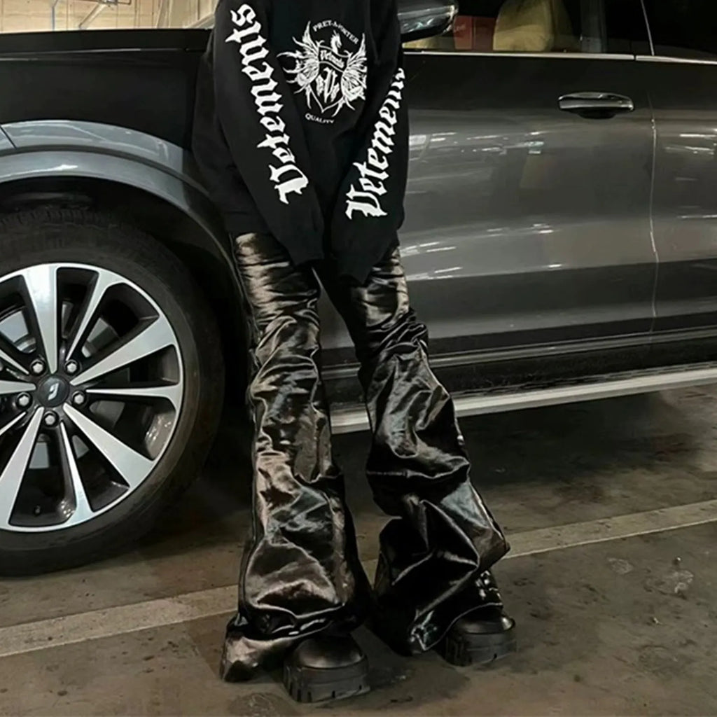 Black coated shiny patent leather skinny jeans with straight-leg mid-waist design