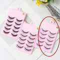 Pack of manga-style false eyelashes showing natural wispy lashes on a black plastic band.