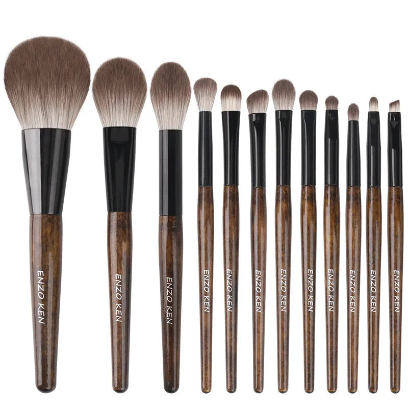 12-piece makeup brush set with synthetic bristles and wooden handles in PU travel roll